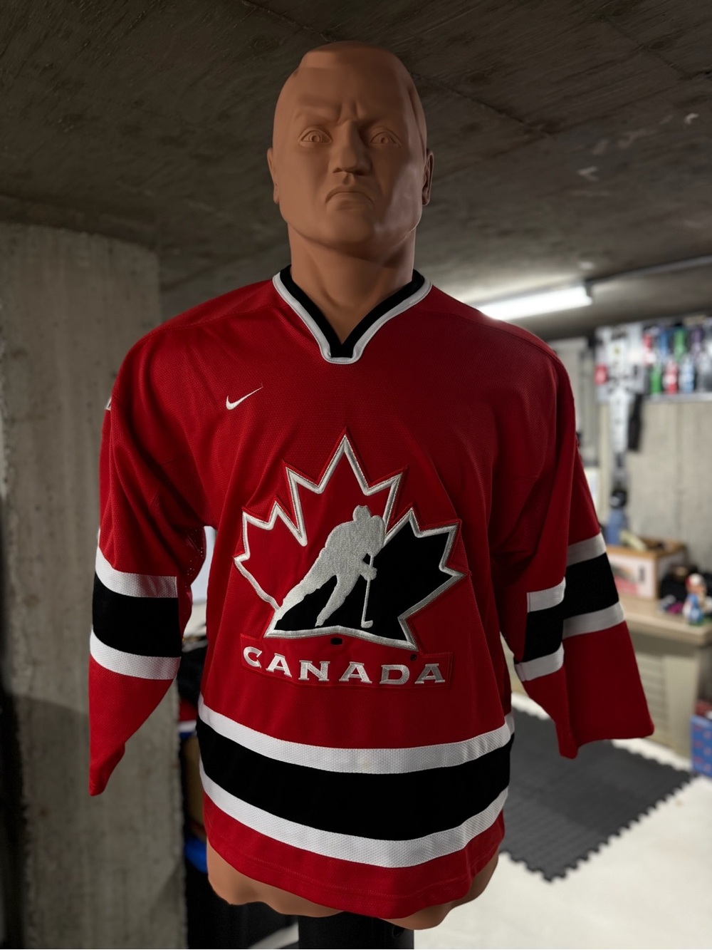 Offical Nike Red Canada Hockey Jersey with Black and White Accents